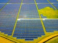 Aerial view of solar batteries field in english countryside Royalty Free Stock Photo