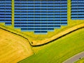 Aerial view of solar batteries field in english countryside Royalty Free Stock Photo