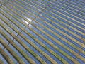 Aerial view of a solar farm producing clean renewable sun energy Royalty Free Stock Photo