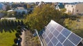 Aerial view of solar panals on the roof of small house