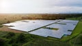 Aerial view of solar panels, clean energy power generation farm