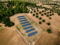 Aerial view of Solar panels farm in a field in the countryside in Greece. Royalty Free Stock Photo