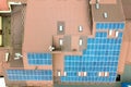 Aerial view of solar power plant with blue photovoltaic panels mounted of apartment building roof Royalty Free Stock Photo