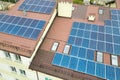 Aerial view of solar power plant with blue photovoltaic panels mounted of apartment building roof Royalty Free Stock Photo