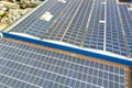 Aerial view of solar power plant with blue photovoltaic panels mounted of industrial building roof Royalty Free Stock Photo