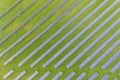 Aerial view of solar power plant on green field. Electric panels for producing clean ecologic energy. Solar cell field. megawatt Royalty Free Stock Photo