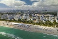 Aerial view of South Beach sandy surface with tourists relaxing on hot Florida sun. Miami Beach city with high luxury Royalty Free Stock Photo