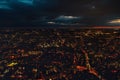 Aerial view of south west London, blue hour just after sunset, orange yellow street lights starting to glow Royalty Free Stock Photo