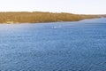 Aerial view of speeding boat in sea. Speed boat at sea. View from above. Speedboat floating in a turquoise blue sea water. Motorbo