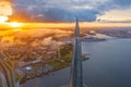 Aerial view of the spire of a skyscraper Lakhta Center and a panorama coast of the Gulf of Finland and the islands of the city,