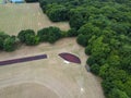 Aerial view of sports fields, Hertford Heath and Haileybury College in the background