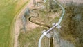 Aerial view in springtime with a trail and spiraling river