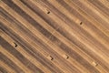 Aerial view of square hay bales in field after harvest Royalty Free Stock Photo