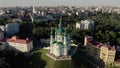 Aerial View of St. Andrews Church, orthodox Church on green hill in the city
