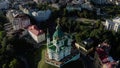 Aerial View of St. Andrews Church, orthodox Church on green hill in the city