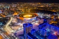 Aerial view of the stadium with night illumination and residential buildings Royalty Free Stock Photo