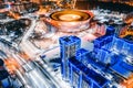 Aerial view of stadium with night illumination and residential buildings Royalty Free Stock Photo