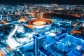 Aerial view of stadium with night illumination and residential buildings Royalty Free Stock Photo