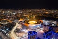 Aerial view of stadium with night illumination and residential buildings in the center of Yekaterinburg. Russia