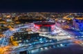 Aerial view of stadium with night illumination and residential buildings in the center of Yekaterinburg. Royalty Free Stock Photo