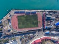 Aerial view of the stadium by the sea. Royalty Free Stock Photo