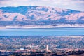 Aerial view of Stanford University amd Palo Alto, San Francisco Bay Area; Newark and Fremont and the Diablo mountain range visible