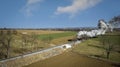 Aerial View of a Steam Double-Header Freight , Passenger Train Approaching Blowing Lots of Smoke Royalty Free Stock Photo