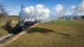 Aerial View of a Steam Double Header Freight and Passenger Train, Traveling Thru Farmlands