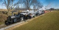 Aerial View of a Steam Double Header Freight and Passenger Train, Traveling Thru Farmlands