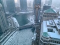 Aerial view of steamy, foggy morning over Chicago River, where chunks of ice float Royalty Free Stock Photo