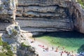 Aerial view on Stiniva Beach, Adriatic Sea bay, people relaxing on the beach, Vis, Vis Island, Croatia Royalty Free Stock Photo