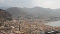 Aerial view of the stony coast, azure sea, and the European city in Italy. Action. Travel and holyday concept, beautiful Royalty Free Stock Photo