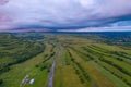 Aerial view of a storm and clouds above a village