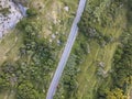 Aerial view of a straight road surrounded by plants and greenery, Pag island, Croatia Royalty Free Stock Photo