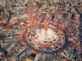 Aerial view on streets of Kathmandu and a stupa of Boudnath is created in the form of a Buddhist mandala.