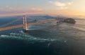 Aerial view of strong current under Naruto bridge at sunset