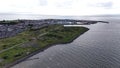 Aerial view of the stunning coastline of Ardrossan, Scotland, featuring crystal blue waters