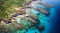 Aerial View Of Stunning Seaside Rocky Cliff With Clear Blue Water