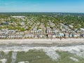 Aerial view of stunning view of beachfront condos situated along an oceanfront in Surfside Beach