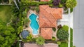 Aerial View of Suburban Luxury Home with Swimming Pool