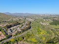 Aerial view suburban neighborhood with identical villas next to each other in the valley. San Diego, California, Royalty Free Stock Photo