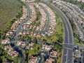 Aerial view suburban neighborhood with identical villas next to each other in the valley. San Diego, California, Royalty Free Stock Photo