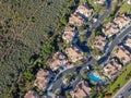 Aerial view suburban neighborhood with identical villas next to each other in the valley. San Diego, California, Royalty Free Stock Photo