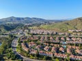 Aerial view suburban neighborhood with identical villas next to each other in the valley. San Diego, California, Royalty Free Stock Photo