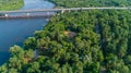 Aerial view summer forest and river in sunny day. Drone shot beautiful nature Royalty Free Stock Photo