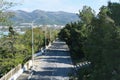 Aerial view of a summer road along the sea and mountains Royalty Free Stock Photo