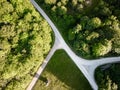 Aerial view of sunny day beautiful forest area with trees and road Royalty Free Stock Photo