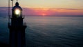 Aerial view of the sunrise joint to Cabo La Nao lighthouse. Royalty Free Stock Photo