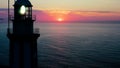 Aerial view of the sunrise joint to Cabo La Nao lighthouse. Royalty Free Stock Photo