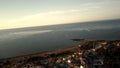 Aerial view sunrise over kiotari beach in Rhodes, greece. Smooth cinematic footage with buildings included